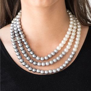 White, silver and gray pearl necklace.